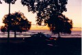 Lake Michigan sunrise over a 1991 Caprice
