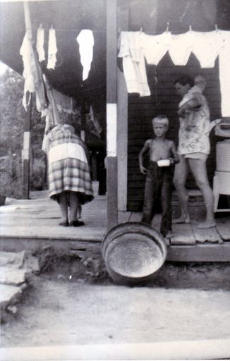 L-R: Jean, and Gaile Dean Austin in front of her, then Elmer Austin, Shirley MYERS Austin, and the baby on her shoulder, is Wayne.