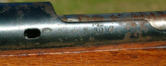 This 1902 Oveido Spanish Mauser has the thumb cutout and the oval gas vent ...